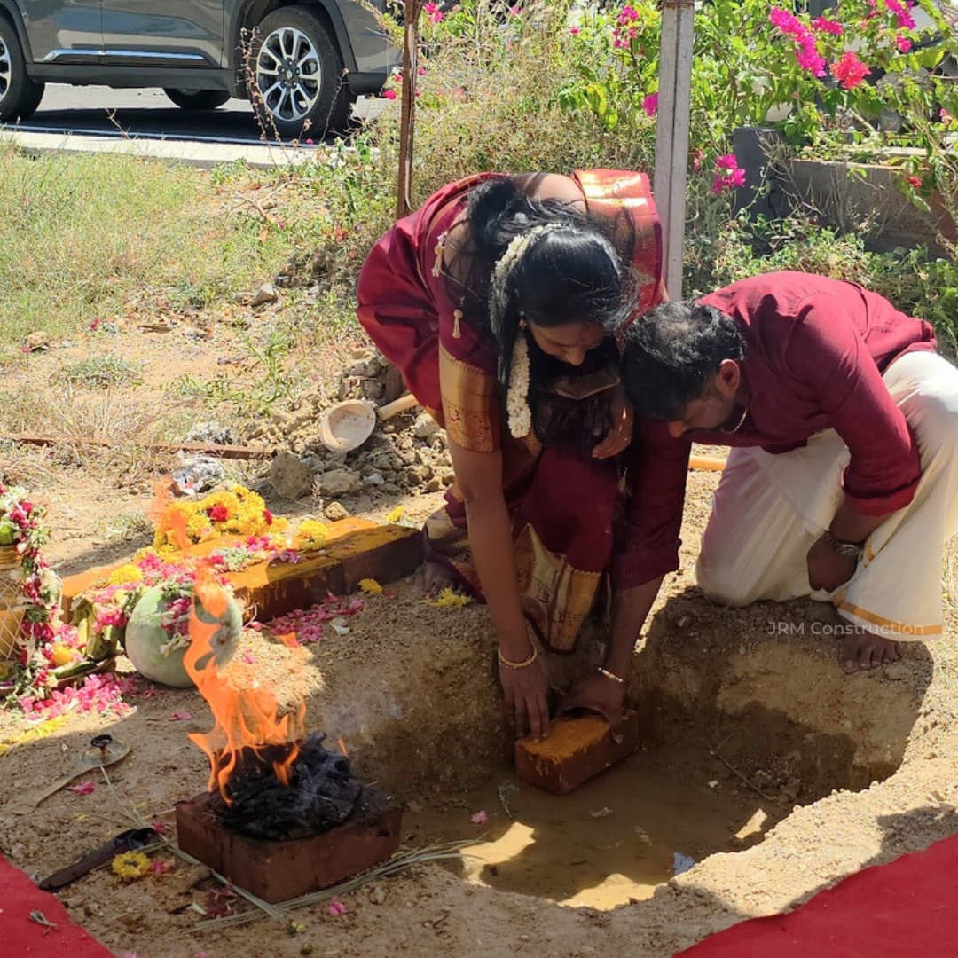 Mr. Arivoli and his wife doing bhoomi pooja rituals.jpg