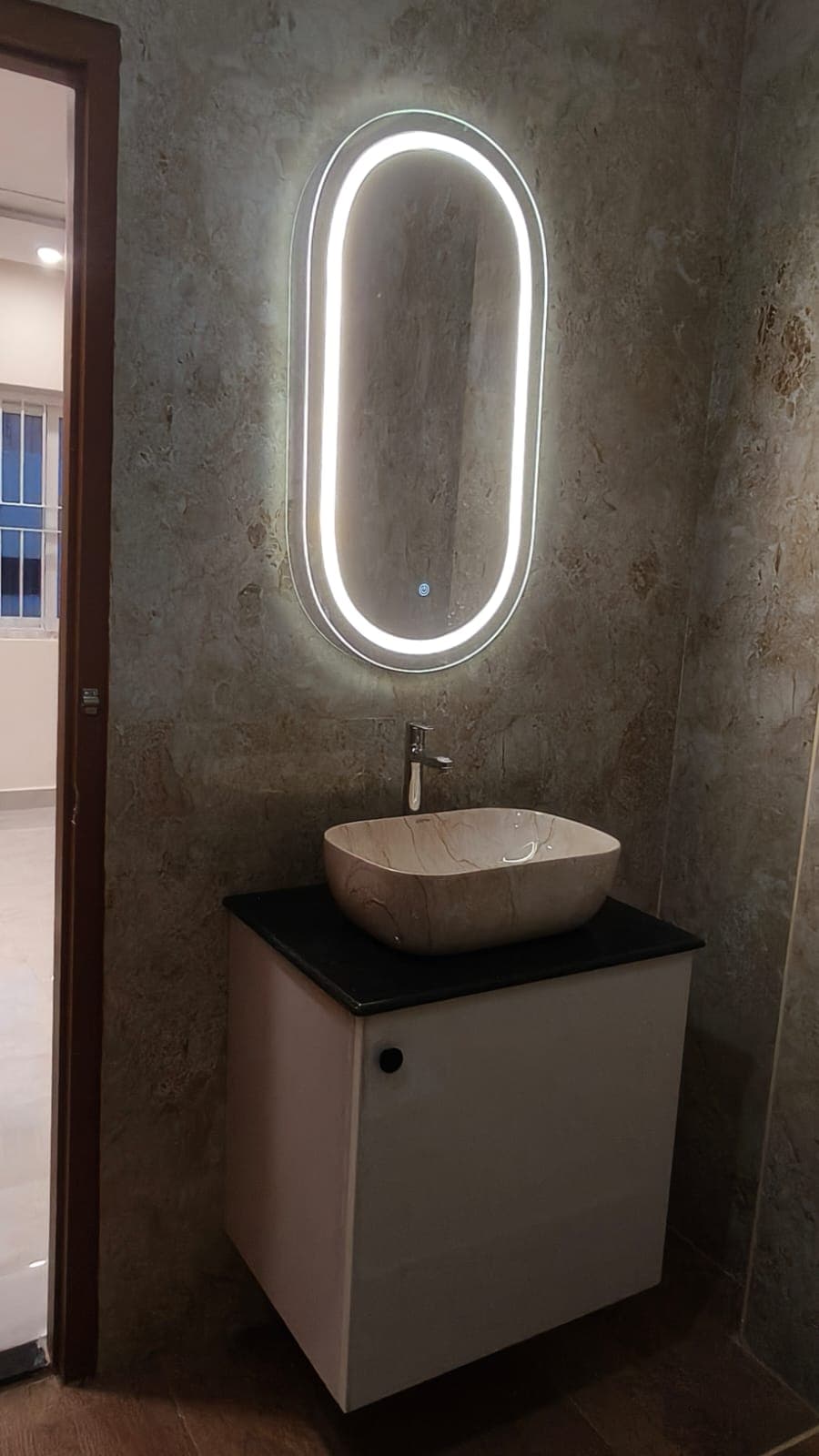 Modern bathroom with lightning glass