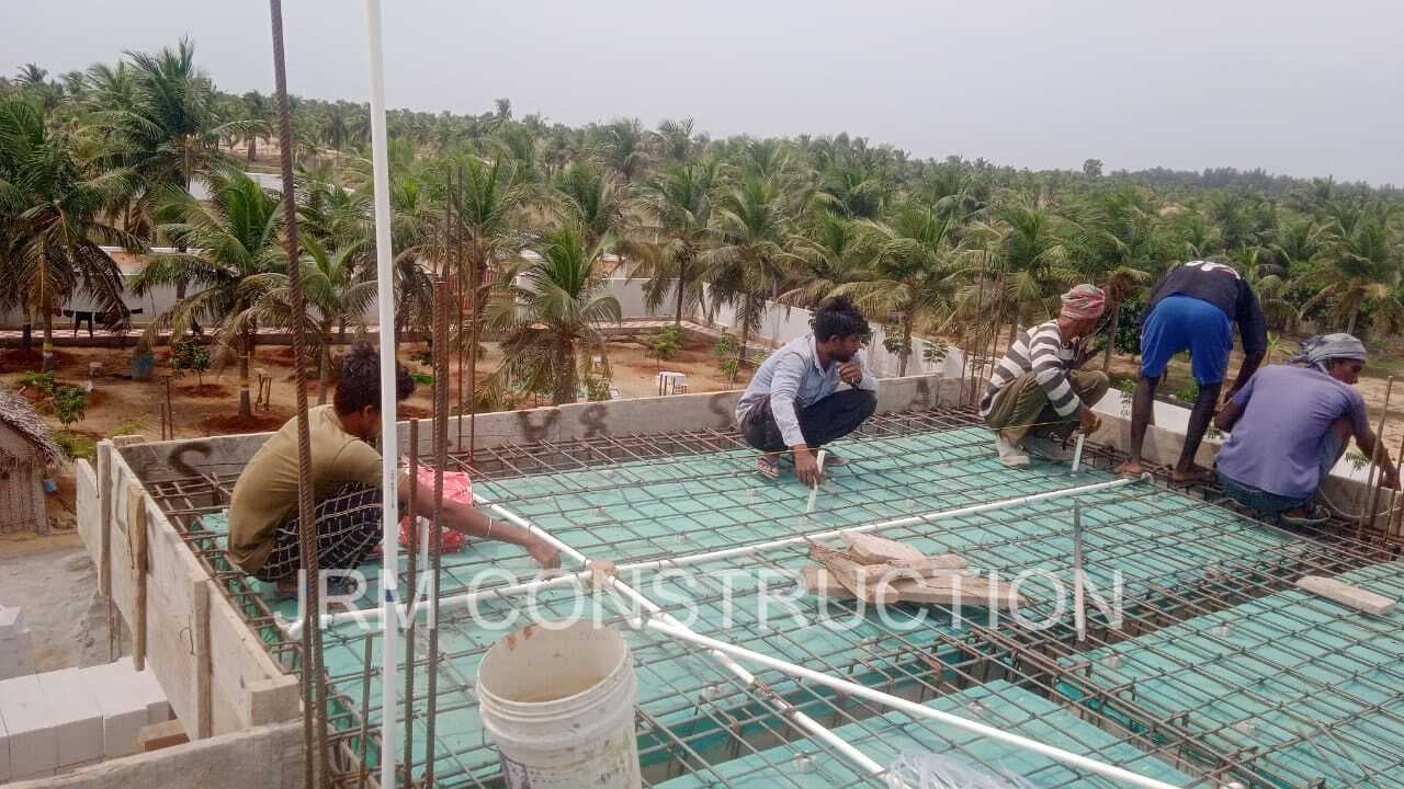 Concrete slab work in progress at JRM Construction farmhouse project in Mugaiyur, Chennai