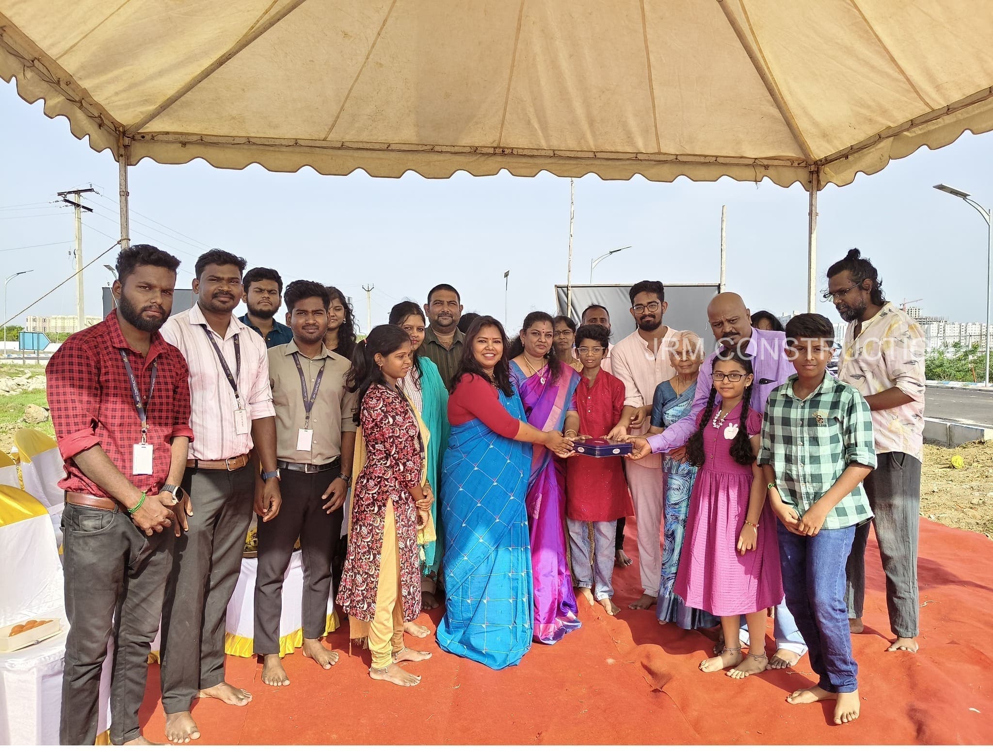 Bhoomi pooja with family and team.jpg