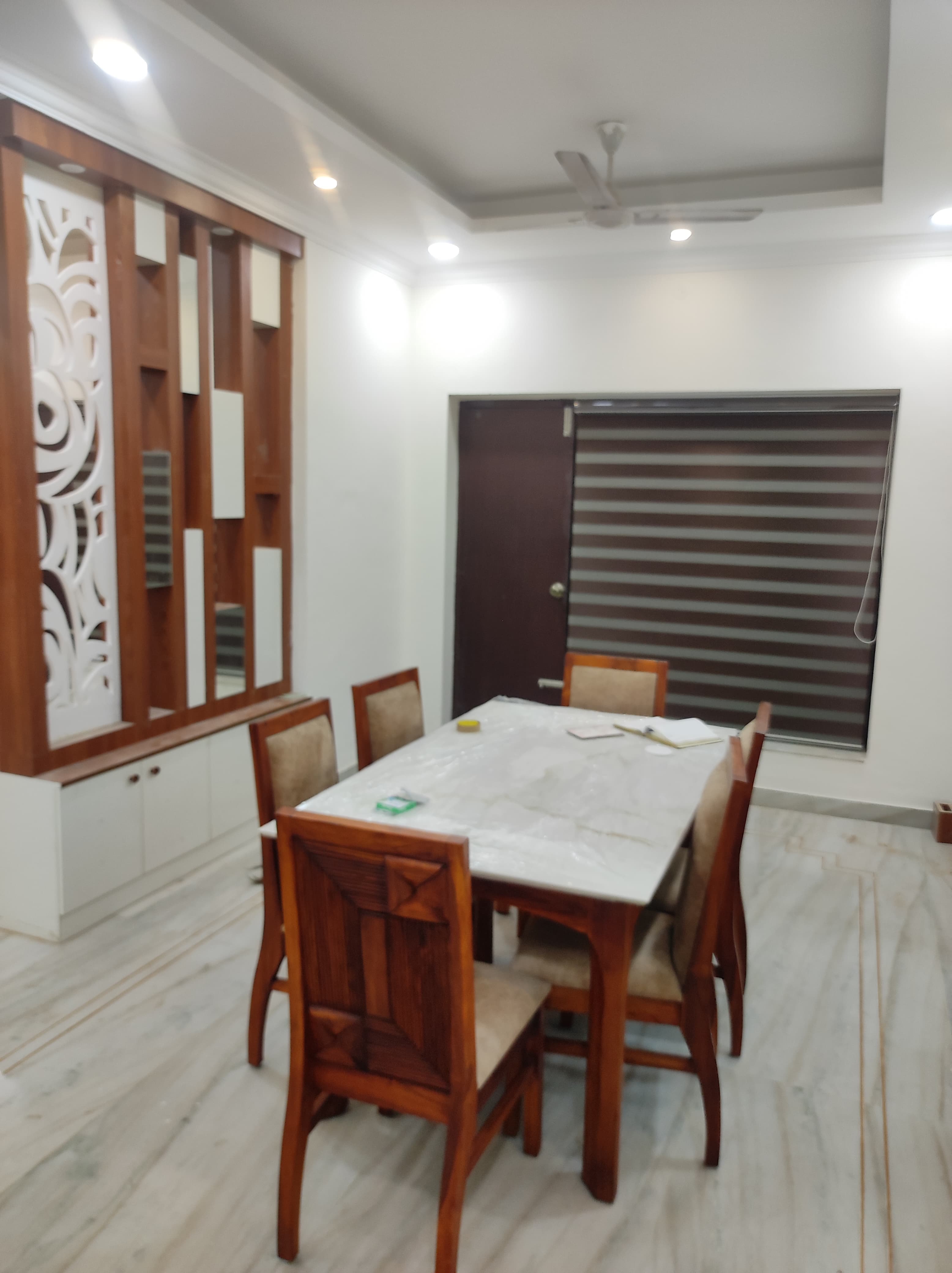 Dining room with partition and table.jpeg