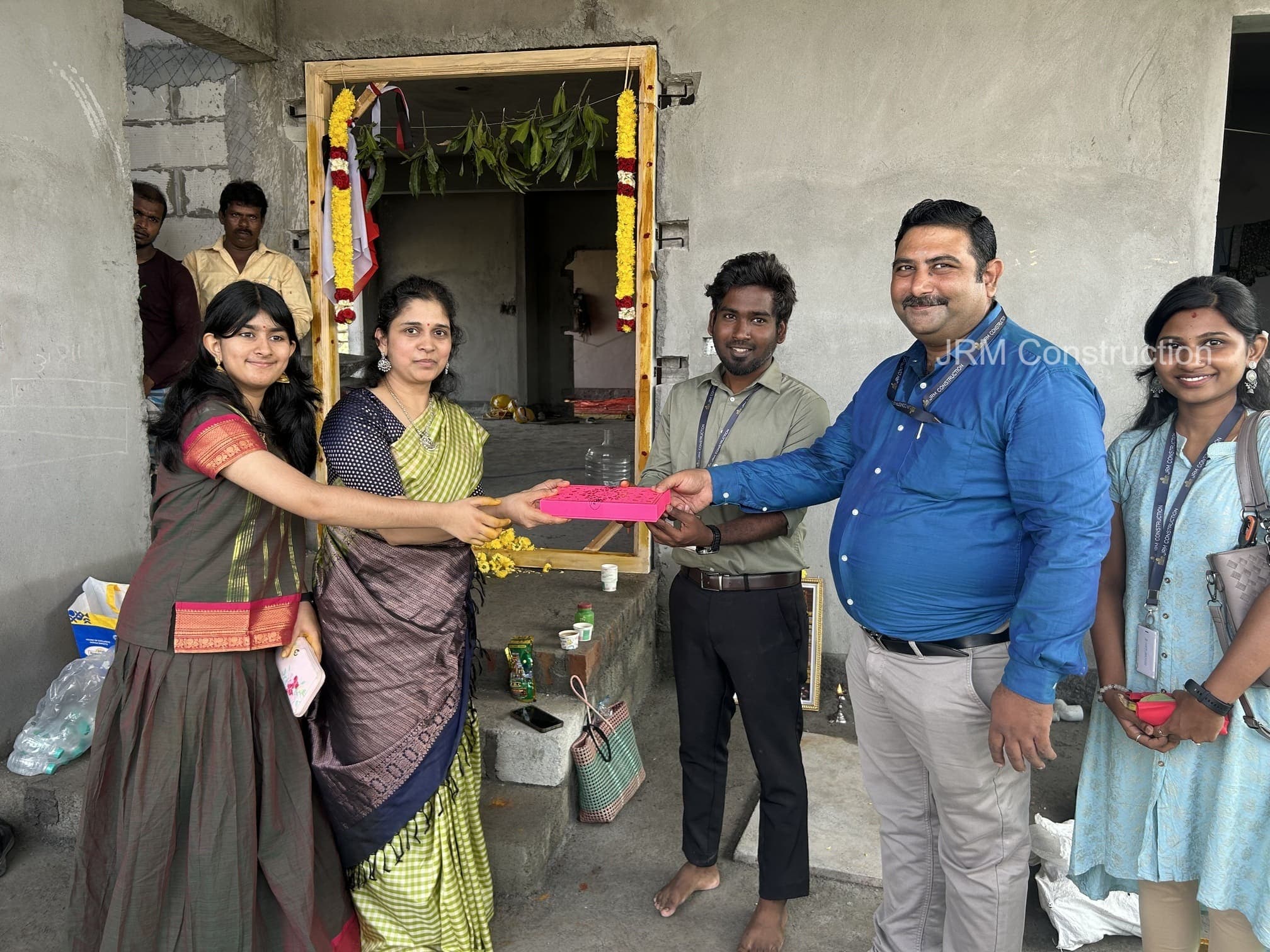 Vasakal Pooja ceremony with family and friends at the construction site.