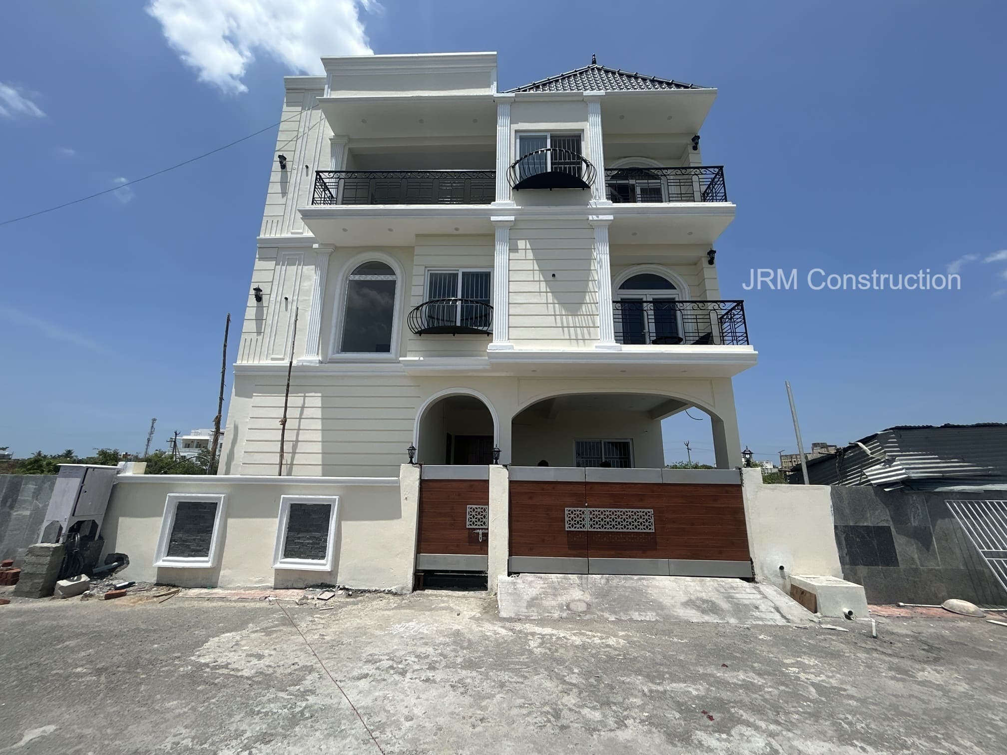 Finished exterior view of the house, ready for final handover.